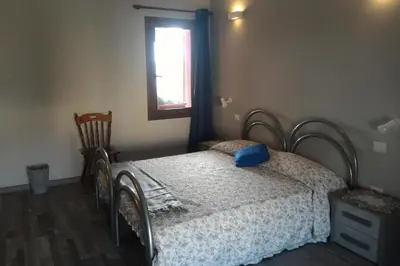Letto o letti in una camera di Corona Bed & Breakfast