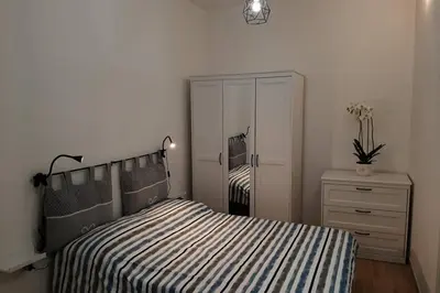 Letto o letti in una camera di Casetta ALU' - il tuo nido a Stampace