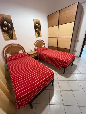Letto o letti in una camera di La Casa sotto la Torre antica