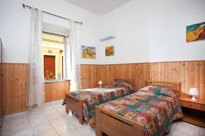 Letto o letti in una camera di Davi