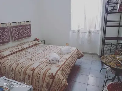 Letto o letti in una camera di I colori di Iglesias