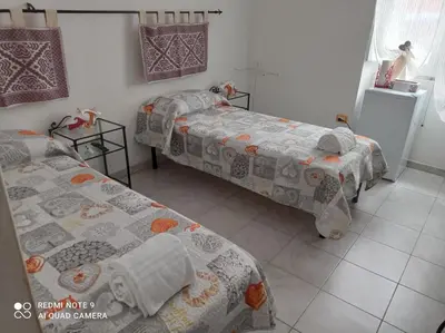 Letto o letti in una camera di I colori di Iglesias