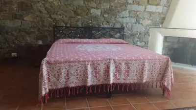 Letto o letti in una camera di La Casa di Zia Zaira