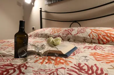 Letto o letti in una camera di B Holidays Casa Vacanze