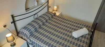 Letto o letti in una camera di B Holidays Casa Vacanze