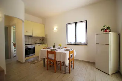 Cucina o angolo cottura di Villetta Turagri 23 a Costa Rei - vicino al mare - Perfetto per famiglie