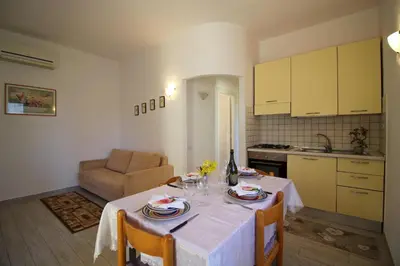 Cucina o angolo cottura di Villetta Turagri 23 a Costa Rei - vicino al mare - Perfetto per famiglie