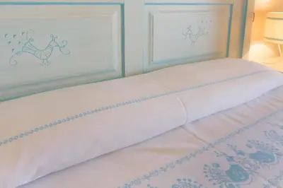 Letto o letti in una camera di Pavoncelle - Appartamento a Villasimius con giardino privato a pochi passi dal mare