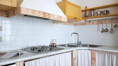 Cucina o angolo cottura di Sardinian Stone House- Beachfront