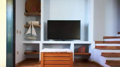 TV o dispositivi per l'intrattenimento presso Sardinian Stone House- Beachfront