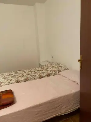 Letto o letti in una camera di APPARTAMENTO SARRALA VISTA MARE