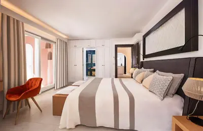 Letto o letti in una camera di Villa Mannus - Splendida villa vista mare con piscina