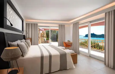 Letto o letti in una camera di Villa Mannus - Splendida villa vista mare con piscina