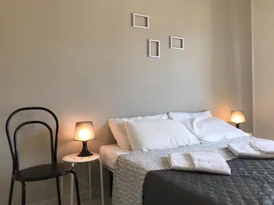 Letto o letti in una camera di Appartamenti Le Mimose