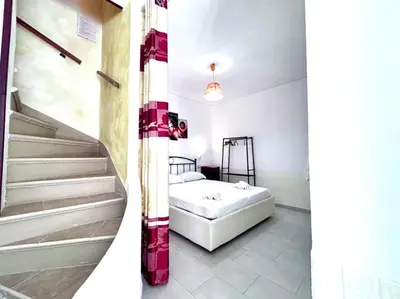 Letto o letti in una camera di Villa Julien Quartu Sant'Elena Sardegna
