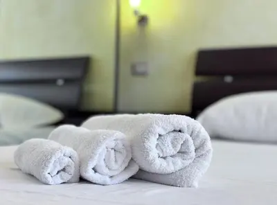 Letto o letti in una camera di Villa Julien Quartu Sant'Elena Sardegna