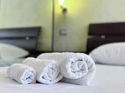Letto o letti in una camera di Villa Julien Quartu Sant'Elena Sardegna