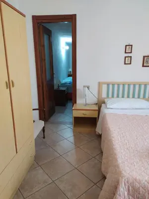 Letto o letti in una camera di Casa Deidda