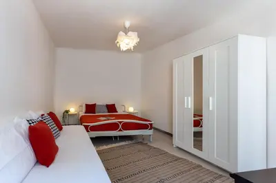 Letto o letti in una camera di DomoMea - La Casa di Anna