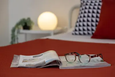 Letto o letti in una camera di DomoMea - La Casa di Anna