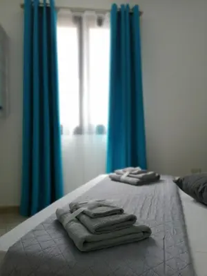 Letto o letti in una camera di Appartamento Monte Granatico 01
