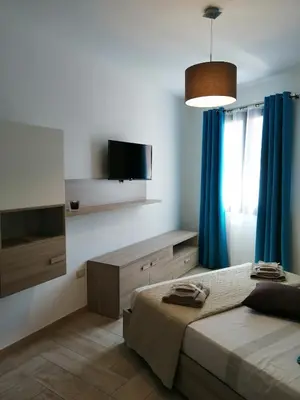 Letto o letti in una camera di Appartamento Monte Granatico 01