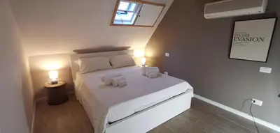 Letto o letti in una camera di Villetta graziosa sul mare