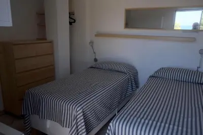 Letto o letti in una camera di Carloforte Bellavista