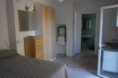Letto o letti in una camera di Carloforte Bellavista