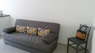 Area soggiorno di Mio & Tuyo Casa Vacanze