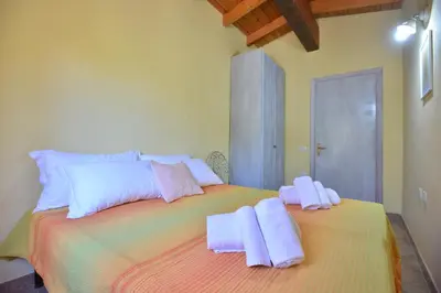 Letto o letti in una camera di IzzHome Nora Beach