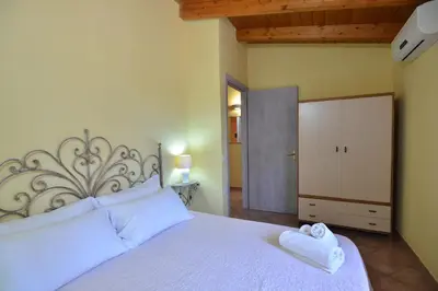 Letto o letti in una camera di IzzHome Nora Beach