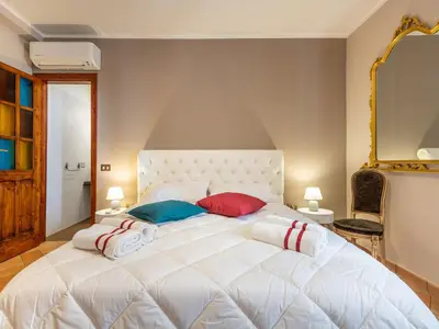 Letto o letti in una camera di La Torretta Domus