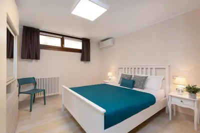 Letto o letti in una camera di relaxing holiday in Sardinia - Matafaluga apartment