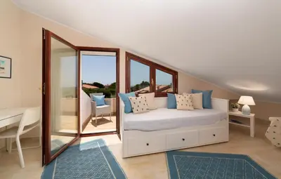 Letto o letti in una camera di relaxing holiday in Sardinia - Matafaluga apartment