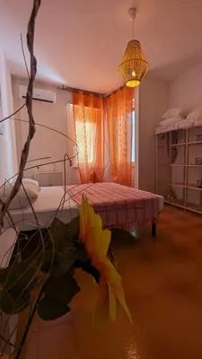 Letto o letti in una camera di Appartamento Nerium - Cala di Seta