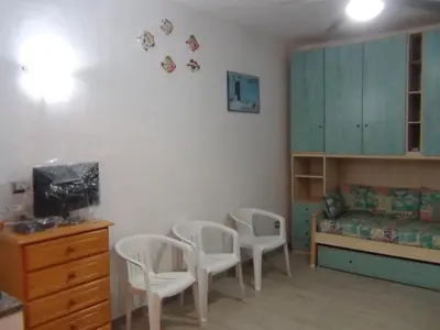 TV o dispositivi per l'intrattenimento presso Costa Rei Free Beach Residence Alloggio a un passo dal mare di Sardegna