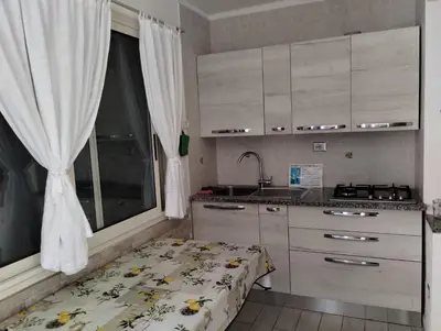 Cucina o angolo cottura di Costa Rei Free Beach Residence Alloggio a un passo dal mare di Sardegna