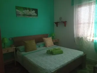 Letto o letti in una camera di Bed & Breakfast Paui