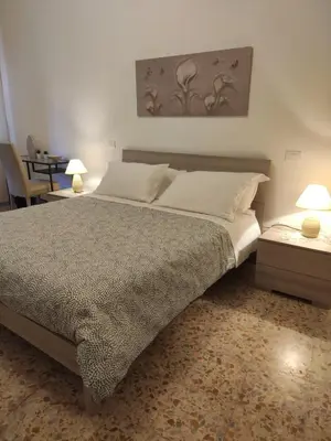 Letto o letti in una camera di B&B 24 Maggio