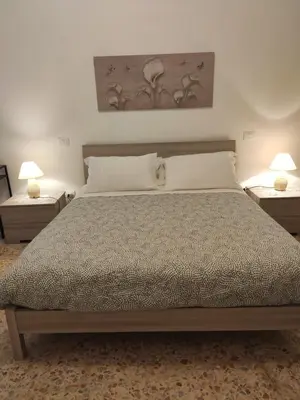Letto o letti in una camera di B&B 24 Maggio