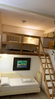 Letto o letti in una camera di Appartamentino Louis