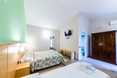 Letto o letti in una camera di Agriturismo Is Cortillaris