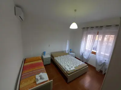 Letto o letti in una camera di Appartamento il tulipano