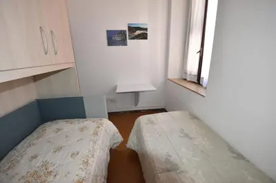 Letto o letti in una camera di La casa di Nonno
