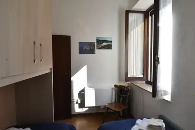 Letto o letti in una camera di La casa di Nonno