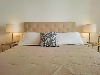 Letto o letti in una camera di Elicriso Suites