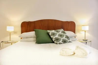 Letto o letti in una camera di Elicriso Suites