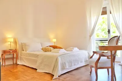 Letto o letti in una camera di Elicriso Suites