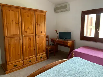 Letto o letti in una camera di Agriturismo Terra Noas